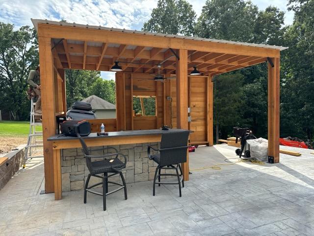 Timber pavilion bar with metal roof