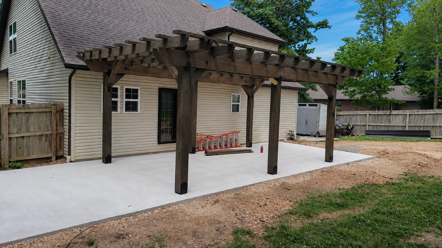 Freestanding timber pergola installed over a concrete patio