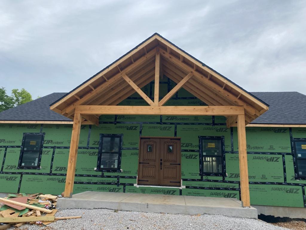 Timber frame porch gable on a new home